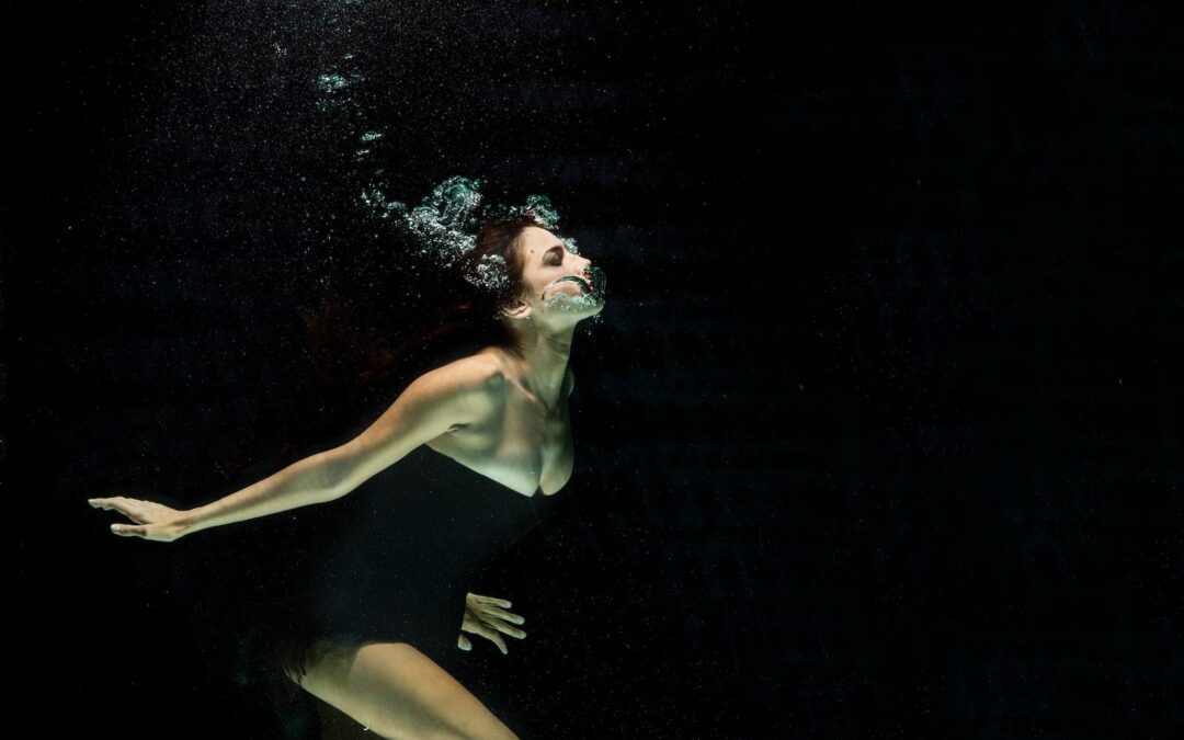 Woman Wearing Black Dress Under Water Photography